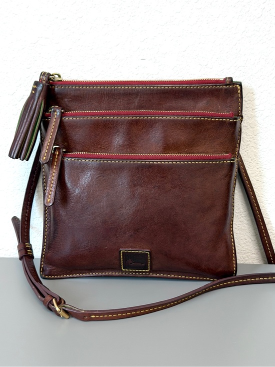 Dooney & Bourke Handbags - Dooney & Bourke Florentine leather triple zip crossbody bag in a chestnut brown